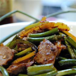 Twice-Cooked Lamb and Garlic Scapes