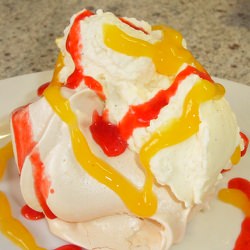 Meringues with Cream & Fruit Coulis