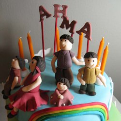 Fondant Figurines on A Rainbow Cake