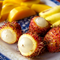 Eating Rambutons in Cambodia