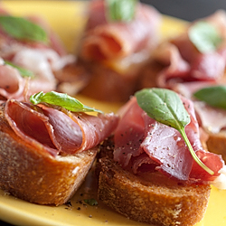 Prosciutto and Basil Crostini