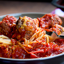 Cheesy Meatballs Baked in Tomato