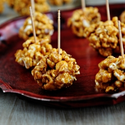 Caramel Popcorn Balls On a Stick