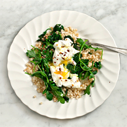 Poached Eggs Over Greens & Couscous