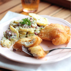 Fried fish with potato salad