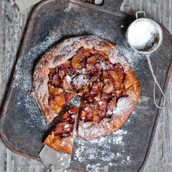 Galette with plums and orange zest