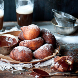 Orange Donuts with Chocolate Sauce