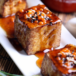 Glazed Tofu with Sriracha Pearls