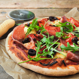 Pizza with Ham, Arugula & Olives