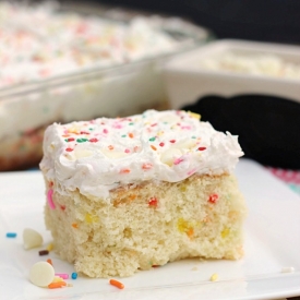 White Chocolate Funfetti Poke Cake