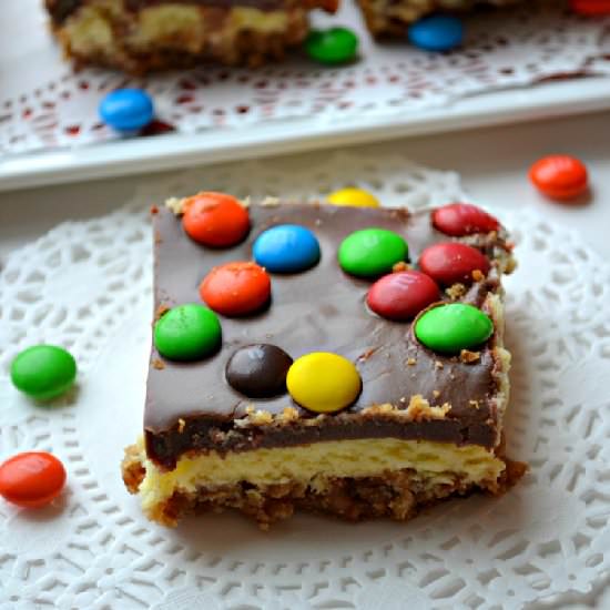 M&M Cheesecake Bars w/Pretzel Crust