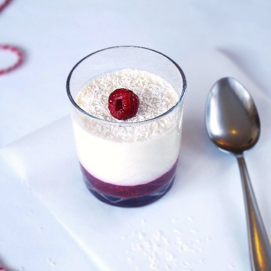 Coconut pudding with raspberries