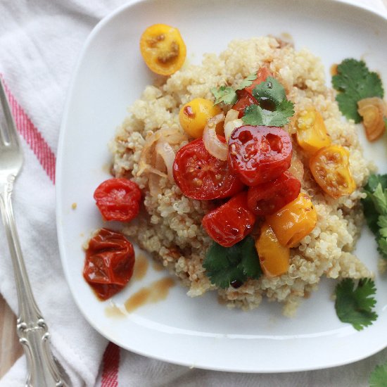 Roasted cherry tomatoes over quinoa