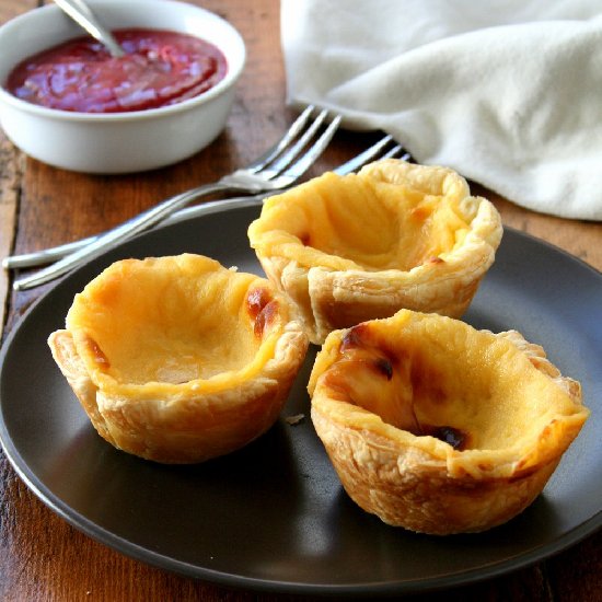 coconut tarts with raspberry sauce