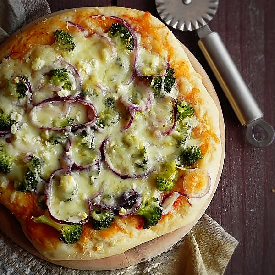 Pizza with broccoli and cheese