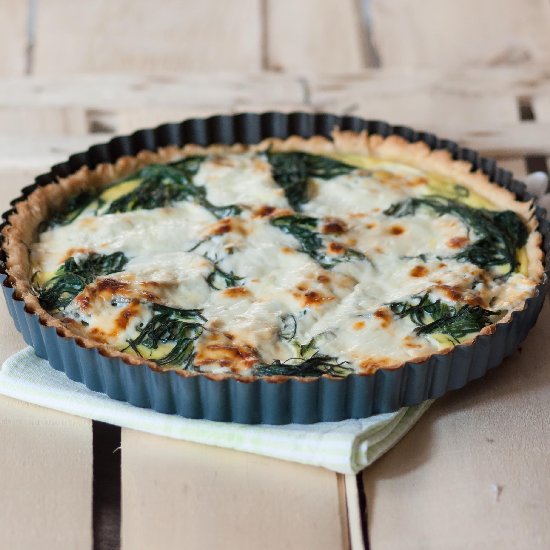 Quiche with vegetables and cheese