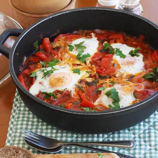 Eggs with tomatoes, peppers & bacon