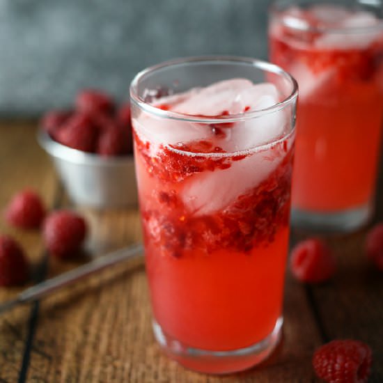 Sour Raspberry Tom Collins