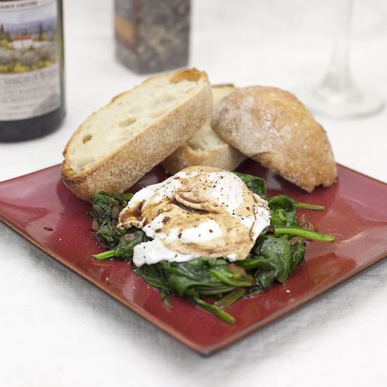 Poached Eggs over Spinach Salad