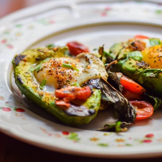 Eggs in Avocado with Tomato & Basil