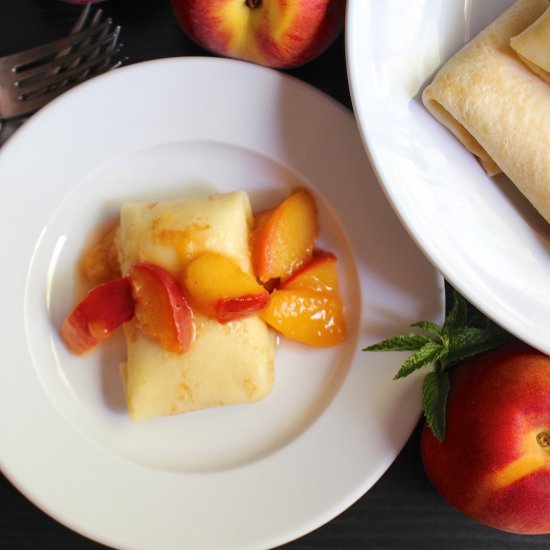 Hot Buttered Peach Blintzes