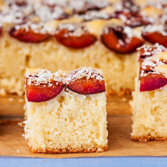 Coconut yogurt cake with plums