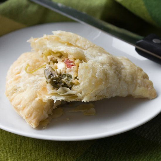 Artichoke-red pepper pastry pies