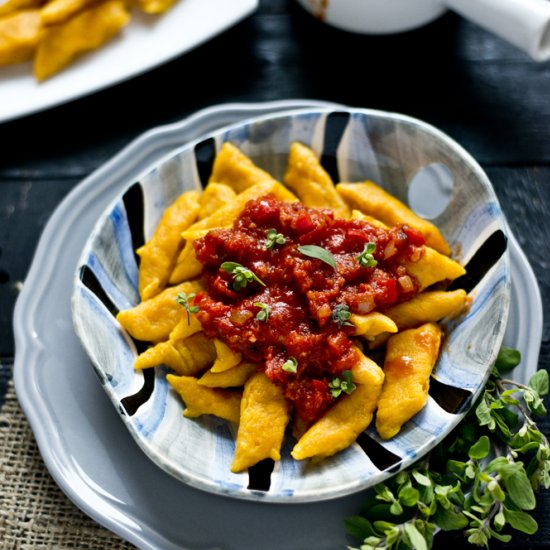 Pumpkin gnocchi with tomato sauce