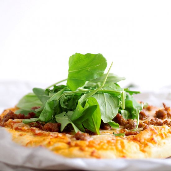 Spicy Sausage and Arugula Pizza