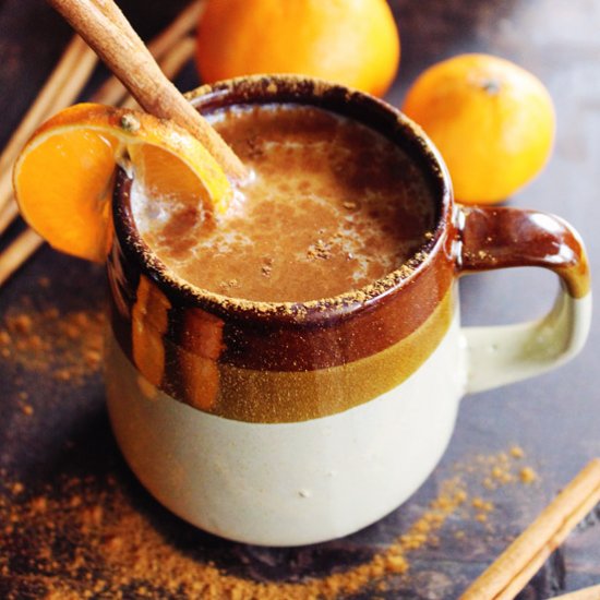 Vegan chai with whiskey and orange