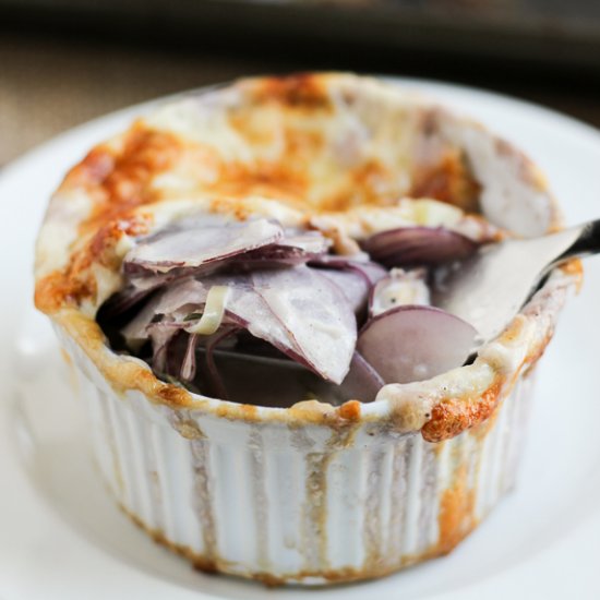 Creamy Purple Potato & Leek Gratin