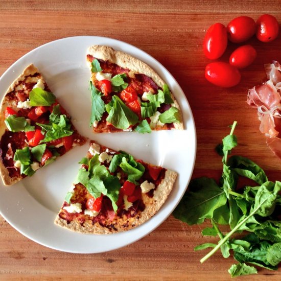 Parma ham, ricotta & rocket pizza