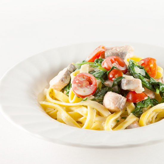 Creamy salmon spinach tagliatelle