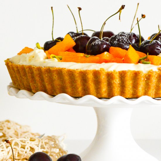 Persimmon, cherry, pistachio tart