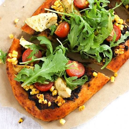 Corn and artichoke vegan pizza