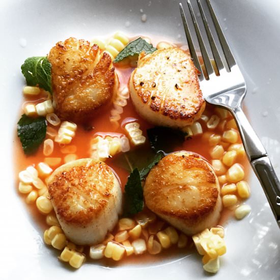 scallops with tomato water and corn