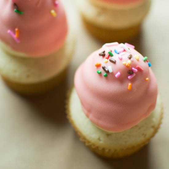 Colored Chocolate Dipped Cupcakes