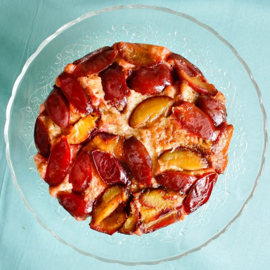 Upside-down plum and coconut cake