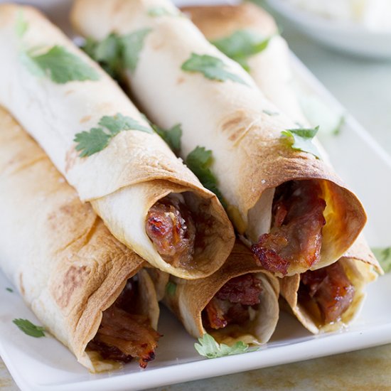 Slow Cooker Sweet Pork Taquitos