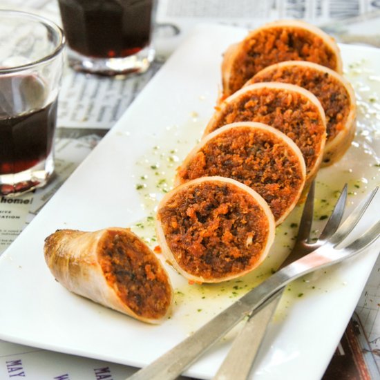 Squid stuffed with spicy sausage