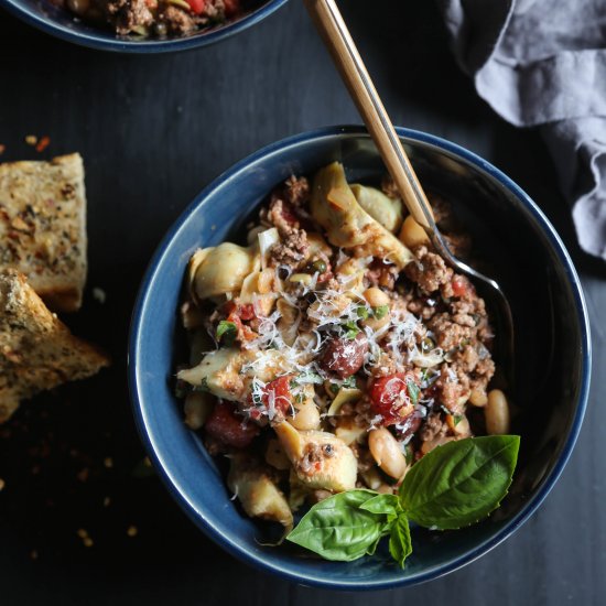 Beef Puttanesca with Garlic Bread