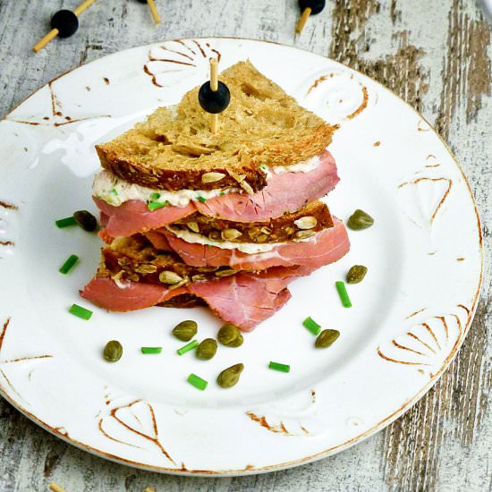 Tuna salad and pastrami sandwich