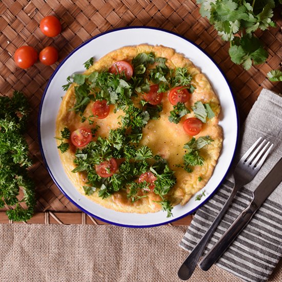 Cheese, tomato and herb omelette