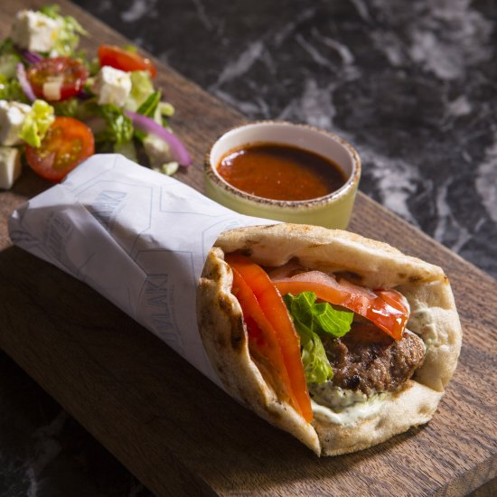 Lamb wrap with red pepper sauce