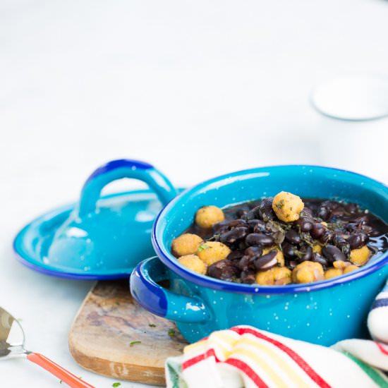 Black bean soup with corn dumplings