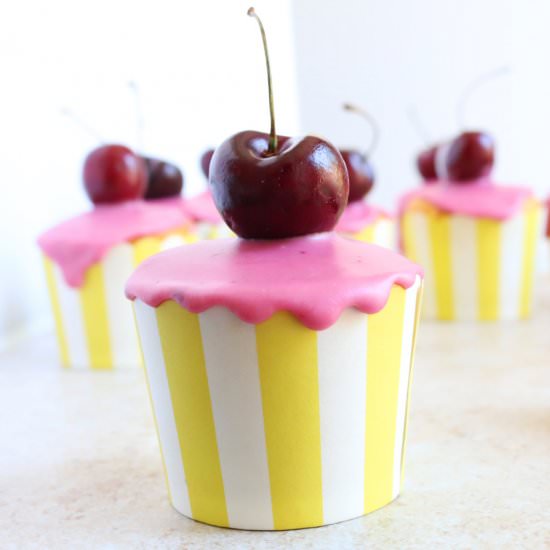 MANGO-COCONUT CUPCAKES WITH CHERRY