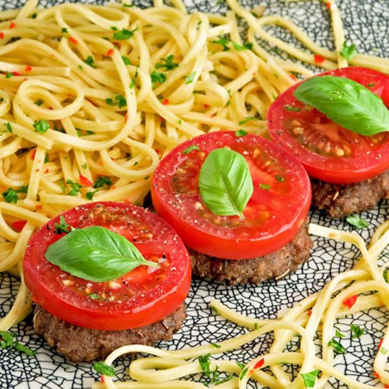 Meatloaf patties with tomatoes