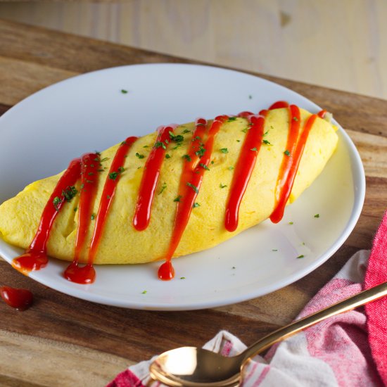 OMURICE: Omelette over ketchup rice