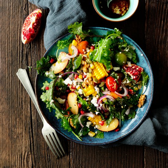 Very juicy kale salad with plums