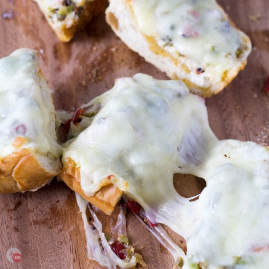 Cheesy Olive Salad French Bread